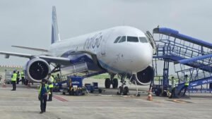 Gujarat, India: An IndiGo flight operating from Dubai to Mumbai made a precautionary emergency landing at Rajkot International Airport in Gujarat on Monday, July 27, after the crew reportedly detected a smoke alert from the aircraft's cargo hold area. All 194 people onboard, comprising 187 passengers and seven crew members, safely disembarked after the Airbus A321 landed at Rajkot. The flight, IndiGo 6E 1452, was operating from Dubai International Airport to Chhatrapati Shivaji Maharaj International Airport in Mumbai. The aircraft departed Dubai at around 11:30 a.m. IST before being diverted to Rajkot as a precaution following the reported smoke indication from the cargo hold. An airport official said, "Flight IGO1452, aircraft type A321, operating from Dubai to Mumbai, was diverted to Rajkot due to smoke detected in the cargo hold area." Airport authorities were alerted to the situation at around 2:45 p.m., following which a full emergency was declared at Rajkot International Airport. Emergency response teams, including fire tenders, ambulances, rescue vehicles and medical personnel, were deployed as part of the airport's emergency procedures. Local hospitals and police authorities were also alerted and kept on standby. The flight crew initially detected smoke indicators in the cargo hold during the mid-air journey, prompting the diversion to Rajkot as a precaution. IndiGo, however, said in a statement: “IndiGo flight 6E 1452, operating from Dubai to Mumbai, was diverted to Rajkot International Airport today as a precautionary measure due to a technical issue. The aircraft landed safely at Rajkot, and all passengers have deboarded securely. An inspection of the aircraft is currently underway before it is cleared to resume operations,” the spokesperson said. The Airbus A321 landed safely at Hirasar International Airport, also known as Rajkot International Airport, at approximately 3:27 p.m. Police, security personnel and firefighters were present at the airport as the aircraft arrived. No injuries were reported among the passengers or crew. Sources at the airport said IndiGo was arranging another aircraft to carry the affected passengers onward to Mumbai. The exact cause was not immediately established, and reports did not confirm whether an actual fire occurred in the cargo compartment. Authorities were expected to examine the aircraft to determine the cause. The incident triggered the airport's full emergency response protocol, but the aircraft completed the landing without any reported damage or injuries.