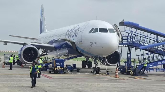 Gujarat, India: An IndiGo flight operating from Dubai to Mumbai made a precautionary emergency landing at Rajkot International Airport in Gujarat on Monday, July 27, after the crew reportedly detected a smoke alert from the aircraft's cargo hold area. All 194 people onboard, comprising 187 passengers and seven crew members, safely disembarked after the Airbus A321 landed at Rajkot. The flight, IndiGo 6E 1452, was operating from Dubai International Airport to Chhatrapati Shivaji Maharaj International Airport in Mumbai. The aircraft departed Dubai at around 11:30 a.m. IST before being diverted to Rajkot as a precaution following the reported smoke indication from the cargo hold. An airport official said, "Flight IGO1452, aircraft type A321, operating from Dubai to Mumbai, was diverted to Rajkot due to smoke detected in the cargo hold area." Airport authorities were alerted to the situation at around 2:45 p.m., following which a full emergency was declared at Rajkot International Airport. Emergency response teams, including fire tenders, ambulances, rescue vehicles and medical personnel, were deployed as part of the airport's emergency procedures. Local hospitals and police authorities were also alerted and kept on standby. The flight crew initially detected smoke indicators in the cargo hold during the mid-air journey, prompting the diversion to Rajkot as a precaution. IndiGo, however, said in a statement: “IndiGo flight 6E 1452, operating from Dubai to Mumbai, was diverted to Rajkot International Airport today as a precautionary measure due to a technical issue. The aircraft landed safely at Rajkot, and all passengers have deboarded securely. An inspection of the aircraft is currently underway before it is cleared to resume operations,” the spokesperson said. The Airbus A321 landed safely at Hirasar International Airport, also known as Rajkot International Airport, at approximately 3:27 p.m. Police, security personnel and firefighters were present at the airport as the aircraft arrived. No injuries were reported among the passengers or crew. Sources at the airport said IndiGo was arranging another aircraft to carry the affected passengers onward to Mumbai. The exact cause was not immediately established, and reports did not confirm whether an actual fire occurred in the cargo compartment. Authorities were expected to examine the aircraft to determine the cause. The incident triggered the airport's full emergency response protocol, but the aircraft completed the landing without any reported damage or injuries.