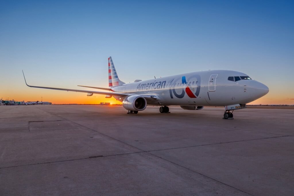Phoenix, United States: A potential mid-air collision was averted near Phoenix Sky Harbor International Airport on August 14, 2026, after two American Airlines Boeing 737-800s were simultaneously operating under the same “American 2482” callsign while flying in opposite directions between Phoenix and Chicago. One aircraft was arriving at Phoenix from Chicago O’Hare International Airport, while another had just departed Phoenix for Chicago. The unusual overlap occurred after the inbound Flight 2482 was delayed by weather, prompting American Airlines to use another aircraft already at Phoenix so passengers waiting for the outbound service could depart on schedule. Because Flight 2482 normally operates as a Chicago-Phoenix round trip using the same flight number, the replacement aircraft also operated under the 2482 identification. The resulting callsign duplication placed both aircraft in the same area of airspace while communicating on the same frequency. Flightradar24 reported that the arriving aircraft was descending through about 11,000 feet while the departing aircraft was climbing toward 9,000 feet when the duplication was recognized. The FAA said the aircraft maintained the required separation throughout the incident. The Phoenix air traffic controller quickly recognized the problem and began distinguishing the two aircraft as “American 2482 on the arrival” and “American 2482 on the departure.” The controller then kept the arriving aircraft above the departing aircraft and prevented the departure from climbing into the arrival’s altitude, maintaining vertical separation as their flight paths converged. The controller also alerted both crews to the other aircraft. Reports said the pilots were able to see each other while they were still miles apart, providing an additional layer of awareness as the two aircraft crossed paths. No source has publicly released an exact minimum horizontal distance between the aircraft, and the FAA has confirmed only that required separation was maintained. The incident was captured in air traffic control audio published by ATC.com and subsequently highlighted by media outlets. After the departing aircraft had cleared the area, the controller said, “I’ve been working air traffic for 25 years. I’ve never seen two aircraft pretty much merge with the same call sign. That’s pretty incredible.” The arriving pilot later complimented the controller, saying “nice work.” The controller responded, “It could have been disastrous, but I’m glad it worked out.” The precise passenger and crew numbers aboard the two Boeing 737-800s have not been publicly disclosed by the FAA or American Airlines. Both aircraft completed their flights safely, with no injuries or collision reported. American Airlines said, “The diligence and professionalism of air traffic controllers and our pilots ensured required separation was always maintained and the issue was identified and addressed. Both flights continued safely and without incident.” Aviation safety expert Steve Arroyo, a former airline dispatcher and pilot, said the incident likely resulted from an oversight within the airline’s dispatch operation. He told Associated Press that someone should have identified that the two aircraft would be airborne at the same time under identical flight numbers. Arroyo described the event as an example of the aviation system’s ability to recover from an error once it reaches another safety layer. The FAA and American Airlines are investigating how the duplicate callsign was allowed to occur. The investigation will determine how the delayed inbound flight and the replacement outbound aircraft were planned and identified, and why the normal safeguards for avoiding simultaneous use of the same callsign did not prevent the situation.