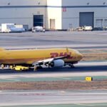 Los Angeles, United States: A DHL Boeing 737-800 freighter suffered a brake-system malfunction during landing at Los Angeles International Airport (LAX) on August 26, 2026, causing four tires to blow and a fire to erupt around its main landing gear. The two crew members aboard the aircraft were not injured. The aircraft, a Boeing 737-800BDSF registered as N326FL, was operated by Kalitta Charters II on behalf of DHL as Flight K5-1814 from Phoenix Sky Harbor International Airport to Los Angeles. The freighter landed on Runway 25L at approximately 11:10 p.m. local time. Video footage shows the aircraft touching down before white smoke began emerging from the main landing-gear area. Within seconds, several loud pops and flashes were visible, followed by flames and sparks beneath the aircraft as it continued its landing roll. The aircraft subsequently slowed and stopped on the runway while fire crews moved toward it. Footage showed flames concentrated around the landing-gear and tire area as emergency responders began extinguishing the fire. During the incident, the flight crew communicated with air traffic control about the braking problem. In the recorded radio exchange, one of the pilots said, “I don’t know if we blew a tire, but it feels like the brakes locked up.” The crew also advised the tower that the anti-skid system was inoperative and that the brakes may have locked up, with the crew concerned that some of the tires could have been damaged. The Federal Aviation Administration said preliminary information indicated that the aircraft’s brakes malfunctioned during landing and that four tires were blown. The agency has launched an investigation into the incident, meaning the precise mechanical cause has not yet been established. The Los Angeles Fire Department responded after receiving a report of an aircraft fire at approximately 11:06 p.m. The department deployed 13 units to the scene. Firefighters initially received information indicating an engine fire, but after reaching the aircraft, they determined that the problem involved the landing gear and brakes. The LAFD said the left main landing gear caught fire and that the flames spread to the tires on that side. Firefighters used water to extinguish the fire, and the aircraft's two occupants were able to leave the aircraft without assistance. No injuries were reported. The final LAFD unit left the scene at approximately 12:44 a.m. “The cause of the mechanical failure remains under investigation by the appropriate federal and company authorities,” the Los Angeles Fire Department said. DHL described the event as an “apparent brake system issue” that resulted in a brake overheat. The company confirmed that everyone aboard was safe and said the aircraft operator was working to move the disabled freighter so that it could undergo further inspection and assessment. “There were no injuries, and all crew members are safe,” DHL said. The incident temporarily closed Runway 25L as emergency personnel and maintenance crews dealt with the disabled aircraft. Air traffic control also kept other aircraft clear of the runway while the emergency response was underway. The aircraft remained on the ground at LAX into the following morning while arrangements were made to move it from the runway and assess the damage. N326FL is a Boeing 737-800 that was manufactured in 2001 and later converted from passenger service to the BDSF freighter configuration. The conversion was completed in December 2022. The aircraft was operating in DHL livery under Kalitta Charters II, a U.S. cargo carrier. The available evidence establishes the sequence of events as a normal landing followed by a suspected brake lockup or malfunction, tire failures, a fire involving the main landing gear, the aircraft coming to a stop on Runway 25L, and the subsequent response by LAX emergency crews. However, investigators have not yet identified the specific component or technical failure responsible for the brake malfunction.