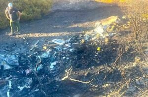 Sifnos, Greece: A private Bell 206 helicopter operated by Bellavia Aviation Services crashed near the heliport on the Greek island of Sifnos on August 17, killing all three people on board. The helicopter was carrying Greek pilot Giorgos Raikos and British newlyweds Alexander Cromie and Marie Ebert. Local reports identified the couple as tourists travelling to Sifnos for their honeymoon. The flight had departed from Markopoulo, near Athens, and was scheduled to arrive at Sifnos at about 6:15 p.m. local time. The crash occurred shortly after 6 p.m. in the Tholos area, close to the island’s heliport and residential properties. Greece’s Fire Service said its operations centre was alerted at 6:17 p.m. Two firefighters and one vehicle were dispatched to tackle the fire, while a rescue team from nearby Syros was sent by a Fire Service RAFNAR high-speed vessel to reinforce the response. The helicopter crashed during its approach to Sifnos and burst into flames on impact. Firefighters recovered the bodies of all three occupants while extinguishing the blaze. Local reports said two victims were found in the wreckage, while the third was located a short distance away. The deputy mayor of Sifnos, Manolis Foundoulakis, said he arrived at the scene minutes after the crash and described the aircraft as almost completely destroyed. “What I saw was an amorphous mass, because almost nothing was left of the helicopter,” he told Greek media. The crash occurred close to homes, but reports said no neighbouring properties were damaged. A local resident told Greek media that the wreckage fell only about 50 metres from inhabited houses and the landing area, beside the Monastery of Panagia Vrysi. Witness accounts have raised the possibility of a technical problem, although no cause has been established. Residents reportedly heard an unusual or loud noise from the helicopter shortly before it crashed, while some reports said smoke was visible before the aircraft went down. Foundoulakis said residents described “a strange noise” and suspected a possible mechanical problem. Video footage circulating after the accident appears to show the helicopter beginning to rotate rapidly shortly before impact. The footage has focused investigators and aviation specialists on the possibility of a loss of tail-rotor effectiveness or failure. However, this remains only a line of inquiry and has not been established as the cause of the crash. Investigators are expected to examine the helicopter’s mechanical components, the video footage, witness statements and available flight data. The aircraft was identified by multiple reports as a Bell 206 operated by Bellavia Aviation Services, a Greek helicopter charter operator that advertises private helicopter transfers to Sifnos and other Greek destinations. Greek authorities have begun investigating the circumstances of the crash. The Fire Service initially secured the scene and conducted the preliminary investigation, while the National Air and Railway Accident Investigation and Safety Board (EODASAAM) is expected to investigate the aviation accident and determine its cause. Greece’s Ministry of Infrastructure and Transport expressed condolences to the families and said the investigation into the circumstances and causes had been transferred to the competent investigation body. The investigation will focus on the final moments of the flight, the aircraft’s technical condition, possible mechanical failure, the flight path and available records, weather conditions, witness accounts and the video showing the aircraft’s final movements. Authorities have not yet released a definitive cause, and mechanical failure, human factors and other possibilities remain under examination.