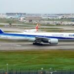 Tokyo, Japan: An All Nippon Airways (ANA) flight arriving from Shanghai carried out a precautionary go-around during its approach to Tokyo Haneda Airport on Tuesday morning after the aircraft's onboard Traffic Collision Avoidance System (TCAS) issued a Resolution Advisory, prompting the flight crew to discontinue the landing and climb away. Japan's Ministry of Land, Infrastructure, Transport and Tourism (MLIT) confirmed that one of the ministry's Civil Aviation Bureau flight inspection aircraft had departed from Haneda's Runway D and was operating in the vicinity when the TCAS alert occurred. The ministry said it is investigating the circumstances surrounding the event. The incident involved ANA Flight NH968, operating from Shanghai Pudong International Airport to Tokyo Haneda Airport, at approximately 6 a.m. local time on August 4. According to ANA, the pilots followed the TCAS instruction as designed, executing an immediate climb before later returning to land safely. No injuries were reported among passengers or crew, and the aircraft landed without further incident. Flight-tracking data published by Flightradar24 indicated that NH968 was on final approach to Haneda's Runway C while the Civil Aviation Bureau aircraft had departed from the intersecting Runway D shortly beforehand. The available tracking data showed the two aircraft operating in close proximity, although authorities have not released the minimum separation distance or determined whether air traffic separation standards were breached. Japanese media reported that the inspection aircraft departed as the ANA flight was established on approach, resulting in the collision avoidance system issuing its warning. However, aviation authorities have not yet published a preliminary investigation report detailing the sequence of events or identifying any operational errors. The incident did not result in damage to either aircraft, and airport operations continued after the go-around. Authorities have not announced whether the occurrence will be classified as a serious incident or whether a formal safety investigation will be conducted by the Japan Transport Safety Board. At the time of publication, Japanese authorities had not released further findings, and the investigation remains ongoing.