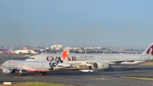 Sydney, Australia: A Jetstar Airbus A320 and a Qatar Airways Boeing 777 came dangerously close to a collision while moving on the ground at Sydney Airport on Sunday morning, August 9, after the Jetstar crew was forced to brake abruptly to avoid the Qatar aircraft. The incident occurred at about 7:00am local time at Sydney Kingsford Smith Airport. The Jetstar A320, operating flight JQ402 from Sydney to Gold Coast Airport, was taxiing for departure when its crew observed the Qatar Airways Boeing 777 being towed by an aircraft tug on a crossing taxiway. The ATSB said both aircraft were brought to an abrupt stop, preventing a collision. According to Australian media reports, the Jetstar aircraft stopped about 50 metres from the Qatar 777. The sudden braking caused a rear cabin crew member aboard the Jetstar aircraft to fall and suffer a broken wrist. No Jetstar passengers were injured. JQ402 was carrying 151 passengers and six crew members, according to Australian media reports. The flight was subsequently cancelled and passengers were rebooked onto later services. The Qatar Boeing 777 was not operating a passenger departure at the time. It had arrived at Sydney from Doha and was being repositioned under tow after passengers had disembarked. The aircraft therefore had no passengers onboard during the near-collision. The precise sequence that brought the two aircraft into such close proximity remains under investigation. Jetstar said its aircraft was following air traffic control instructions when its pilots were forced to brake firmly after another aircraft came into close proximity. The airline has also begun its own investigation. The ATSB said there was damage to the connection between the Qatar 777's nose landing gear and the aircraft tug. Investigators will examine data from both aircraft and air traffic control, while interviewing the flight crew, tug operators, air traffic controllers and other witnesses. CCTV and other recorded information will also be reviewed. ATSB Chief Commissioner Angus Mitchell said it was too early to determine where the communication or coordination breakdown occurred. Investigators will establish what instructions were issued, how they were understood and why the aircraft came so close before the final stop. The incident has also drawn attention to air traffic-control staffing pressures at Sydney Airport. ABC reported that air traffic control was operating under restrictions between 6:00am and 8:00am on Sunday, limiting the number of aircraft moving through the airport. More than 150 flights had also been affected by roster constraints in the days leading up to the incident. However, there is currently no official finding that the staffing situation caused the near-collision. The ATSB investigation will determine whether communication, coordination, ground movements, procedures or other factors contributed. Two people involved in the ground operation, an air traffic ground controller and the tug operator were stood down for mandatory drug and alcohol testing, which the federal transport minister described as standard post-incident procedure. Their stand-down should not be interpreted as a finding of fault. The ATSB has asked anyone with video of Sunday's incident or its immediate aftermath to provide footage to investigators. The investigation remains ongoing.