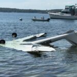 Maine, United States: A Diamond DA20-A1 Katana single-engine aircraft crashed into the water near Fort William Henry in Bristol, Maine, on Thursday, August 20, killing the pilot and injuring the passenger. Two men were aboard the aircraft when it went down near the mouth of the Pemaquid River, where it empties into Pemaquid Harbor. The crash was reported at around 1 p.m. local time, while the Federal Aviation Administration placed the crash time at approximately 1:40 p.m. The aircraft came down near Fort William Henry in the New Harbor area of Bristol, in Lincoln County, and was found upside down in approximately four feet of water close to shore. The aircraft was identified by the FAA as a Diamond DA20, a two-seat, single-engine aircraft. Aircraft-registration and aviation records identify the accident aircraft as N83RF, a 1996 Diamond DA20-A1 Katana, serial number 10139. The aircraft is a fixed-wing, single-engine airplane with two seats and a Rotax reciprocating engine. Current registration data identifies it as privately registered rather than operated by an airline. According to the Lincoln County Sheriff's Office, the aircraft had departed Brunswick Executive Airport and was headed for Knox County Regional Airport in Owls Head, roughly east of the crash site. Investigators initially believed the aircraft may have experienced a mechanical problem, but officials stressed that the actual cause had not been established. The sheriff's office said, “Initial information indicated the aircraft had left Brunswick Airport with a destination of the Knox County Airport and possibly experienced some type of mechanical failure.” The aircraft's final moments were followed by a rapid response from people on the shoreline. Nearby residents and a building crew who witnessed the crash rushed into the water to help. The pilot was pulled from the aircraft but died at the scene, while the passenger managed to escape from the wreckage on his own. The passenger was taken to MaineHealth Lincoln Hospital in Damariscotta, at the Miles campus, with non-life-threatening injuries. Officials said he was expected to survive. The identities of both occupants had not been released in the latest reports. The emergency response involved the Bristol Fire and Rescue Department, Lincoln County Sheriff's Office and Central Lincoln County Ambulance Service. The Maine Marine Patrol also assisted at the crash site. Responders placed containment equipment around the aircraft, which was lying inverted in the shallow harbor water. A local marine barge was subsequently used to remove the Diamond DA20 from the water. The aircraft was taken to a secure location where it could be examined as part of the federal investigation. The Federal Aviation Administration and National Transportation Safety Board are investigating the crash. FAA public affairs specialist Rick Breitenfeldt said the “FAA, as well as the National Transportation Safety Board, will investigate the cause of the crash.” No official cause had been determined as of the latest available reports. The initial reference to a possible mechanical failure remains only an investigative lead and should not be presented as the confirmed cause. The NTSB is expected to examine the aircraft, its maintenance history, flight data and other operational factors before determining what led to the crash.
