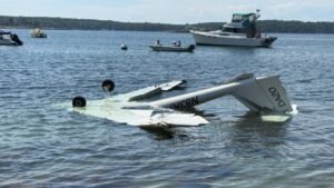 Maine, United States: A Diamond DA20-A1 Katana single-engine aircraft crashed into the water near Fort William Henry in Bristol, Maine, on Thursday, August 20, killing the pilot and injuring the passenger. Two men were aboard the aircraft when it went down near the mouth of the Pemaquid River, where it empties into Pemaquid Harbor. The crash was reported at around 1 p.m. local time, while the Federal Aviation Administration placed the crash time at approximately 1:40 p.m. The aircraft came down near Fort William Henry in the New Harbor area of Bristol, in Lincoln County, and was found upside down in approximately four feet of water close to shore. The aircraft was identified by the FAA as a Diamond DA20, a two-seat, single-engine aircraft. Aircraft-registration and aviation records identify the accident aircraft as N83RF, a 1996 Diamond DA20-A1 Katana, serial number 10139. The aircraft is a fixed-wing, single-engine airplane with two seats and a Rotax reciprocating engine. Current registration data identifies it as privately registered rather than operated by an airline. According to the Lincoln County Sheriff's Office, the aircraft had departed Brunswick Executive Airport and was headed for Knox County Regional Airport in Owls Head, roughly east of the crash site. Investigators initially believed the aircraft may have experienced a mechanical problem, but officials stressed that the actual cause had not been established. The sheriff's office said, “Initial information indicated the aircraft had left Brunswick Airport with a destination of the Knox County Airport and possibly experienced some type of mechanical failure.” The aircraft's final moments were followed by a rapid response from people on the shoreline. Nearby residents and a building crew who witnessed the crash rushed into the water to help. The pilot was pulled from the aircraft but died at the scene, while the passenger managed to escape from the wreckage on his own. The passenger was taken to MaineHealth Lincoln Hospital in Damariscotta, at the Miles campus, with non-life-threatening injuries. Officials said he was expected to survive. The identities of both occupants had not been released in the latest reports. The emergency response involved the Bristol Fire and Rescue Department, Lincoln County Sheriff's Office and Central Lincoln County Ambulance Service. The Maine Marine Patrol also assisted at the crash site. Responders placed containment equipment around the aircraft, which was lying inverted in the shallow harbor water. A local marine barge was subsequently used to remove the Diamond DA20 from the water. The aircraft was taken to a secure location where it could be examined as part of the federal investigation. The Federal Aviation Administration and National Transportation Safety Board are investigating the crash. FAA public affairs specialist Rick Breitenfeldt said the “FAA, as well as the National Transportation Safety Board, will investigate the cause of the crash.” No official cause had been determined as of the latest available reports. The initial reference to a possible mechanical failure remains only an investigative lead and should not be presented as the confirmed cause. The NTSB is expected to examine the aircraft, its maintenance history, flight data and other operational factors before determining what led to the crash.