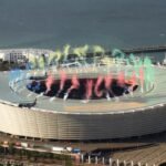 Airlink Formation Flypast Prompts Safety Review After Jets Pass 41 Feet Above Stadium SEO DES: Airlink said the flypast was planned and approved by SACAA, while the regulator is reviewing whether it complied with approved safety parameters SOCIAL: Two Airlink Embraer jets flew over Cape Town’s DHL Stadium on August 29, 2026, just before the Springboks-All Blacks Test. Flightradar24 estimated the lead aircraft passed only 41–46 feet above the stadium roof, raising safety concerns. Airlink said the flypast was carefully planned, rehearsed and approved by SACAA, with no passengers aboard and no reported injuries or aircraft damage. SACAA obtained the aircraft’s flight-data recordings and began reviewing whether the operation complied with approved safety parameters. SACAA has yet to issue its final findings. Meanwhile, Airlink withdrew its planned September 5 flypast at Johannesburg’s FNB Stadium, citing unfavourable weather, amid continuing scrutiny of the Cape Town operation. Cape Town, South Africa: Two Airlink Embraer jets flew as close as an estimated 41-46 feet (12.5-14 metres) above the roof of Cape Town’s DHL Stadium during a pre-match formation flypast on August 29, 2026, prompting a South African Civil Aviation Authority (SACAA) compliance review after footage of the manoeuvre went viral. The flypast took place shortly before the second Test between the Springboks and New Zealand’s All Blacks in the four-match Rugby’s Greatest Rivalry series. About 56,000 spectators were in the stadium as the two aircraft passed overhead before South Africa went on to defeat New Zealand 33-26. The aircraft involved were an Embraer E195, registration ZS-YDE, flying in a black All Blacks-themed livery, and an Embraer E190, registration ZS-YAE, carrying a green Springboks-themed livery. The E195 was the lead aircraft and was the one that came closest to the stadium roof based on flight-tracking calculations. Neither aircraft carried passengers. Airlink said each jet was operated by three senior captains serving as commander, co-pilot and safety/technical officer, with the crews having more than 75,000 combined flight hours. The aircraft flew at about 150 knots during the low-level formation pass. Airlink said the manoeuvre had been extensively planned and rehearsed and was conducted with guidance, approval and support from SACAA and Air Traffic Navigation Services. Flight-tracking service Flightradar24 later analysed ADS-B data from the operation. It recorded a lowest raw altitude of 50 feet at standard pressure. After correction for Cape Town’s local pressure setting of 1019 hPa, the aircraft were estimated to have been at about 205-210 feet above mean sea level. With DHL Stadium standing approximately 164 feet high, the estimated clearance above the roof was therefore about 41-46 feet. The low clearance became particularly striking in videos recorded from inside and around the stadium. The trailing aircraft was also seen passing through a cloud of pink dust or smoke generated by the pre-match pyrotechnic display. There has been no confirmed report of either aircraft striking the stadium, pyrotechnics or any other object, and no injuries or aircraft damage have been reported. Airlink defended the operation after the footage triggered criticism online. In its August 30, 2026 statement, the airline said the flight required “careful planning and rehearsal” because it involved low-altitude navigation at around 150 knots. It said SACAA and Air Traffic Navigation Services had provided guidance, approval and support to ensure a safe flyby. The airline also said flight data recorded by both aircraft confirmed that the operation was conducted within the altitude and speed limits approved and rehearsed with SACAA. The regulator subsequently began a compliance review. SACAA said Airlink had submitted three applications for flypasts linked to the rugby matches, with the first operation taking place at Ellis Park in Johannesburg on August 22, 2026 and the second at DHL Stadium on August 29, 2026. According to SACAA, the Cape Town operation had been formally approved under the regulatory provisions governing non-passenger or cargo-carrying flights under Part 91.06.32. The operator had also submitted supporting documentation, completed a simulator practice flight and conducted a safety briefing before the operation. The authority said the flypast was approved in accordance with the requirements for Special Air Events. However, after media and public discussion over the unusually low flight path, SACAA initiated compliance verification, engaged Airlink and obtained the aircraft’s Flight Data Recording downloads. SACAA said it is now analysing the data and has requested additional information from Airlink before reaching an informed position. The authority said a full report containing recommendations will be issued once the assessment is completed. “It is therefore critical that we interrogate this past weekend’s events to determine if there were any safety concerns which warrant a review,” SACAA said. The regulator also emphasised South Africa’s commercial aviation safety record, saying the country had maintained a zero fatal-accident record in commercial airline operations for more than four decades. SACAA said that record was one it intended to preserve as it continued to strengthen aviation safety standards. Airlink CEO de Villiers Engelbrecht later said the airline recognised the public interest generated by the flypast and the questions that followed, adding: “We never intended to become the news or upstage Rugby’s Greatest Rivalry.” Chris Martinus, president of the Aircraft Owners and Pilots Association South Africa, said the lead aircraft appeared to be manoeuvring over the stadium with very little room for error. He said that if something adverse occurred at such an altitude, the pilots would have few options. Australian aviation consultant and former military and commercial pilot Keith Tonkin also warned that turbulence or a bird strike could leave a jet with insufficient room to manoeuvre safely at that height. He said the broader concern was the precedent created by an operation that other operators might seek to replicate. The flypast was part of a long-standing South African rugby tradition. The practice gained particular prominence during the 1995 Rugby World Cup final, when a South African Airways Boeing 747 flew over Ellis Park before the Springboks faced the All Blacks. Airlink had planned to continue the tradition at the next Rugby’s Greatest Rivalry Test at Johannesburg’s FNB Stadium on September 5, 2026. However, the airline notified SACAA on September 1, 2026 that it was withdrawing its application for the third flypast. Airlink said unfavourable weather conditions meant the planned formation flight could not be safely conducted. SACAA confirmed the withdrawal but has not yet released a final finding on the Cape Town operation. The authority’s review will determine whether the two aircraft complied fully with the approved flight parameters and whether any additional safety measures or recommendations are required.