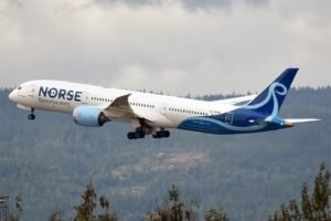 Crawley, United Kingdom: A Norse Atlantic Airways Boeing 787-9 rejected its takeoff from London Gatwick Airport on September 4, 2026 after a reported nose-gear problem, leaving the aircraft disabled on the runway and forcing the airport to temporarily halt flight operations. The aircraft, a Boeing 787-9 Dreamliner registered G-CKOF, was operating Norse Atlantic flight Z0701 from London Gatwick (LGW) to New York John F. Kennedy International Airport (JFK). It was accelerating for departure from Runway 26L when the crew rejected the takeoff at about 120 knots over the ground, according to preliminary aviation incident information. Reports said that the rejected takeoff followed a problem with the aircraft’s nose landing gear and that the nose wheels had turned about 90 degrees. The aircraft then stopped on the runway and became disabled. The precise technical cause of the nose-wheel movement has not been officially declared by the airline. The aircraft remained on Runway 26L while airport emergency teams responded. The incident did not result in any reported injuries among passengers or crew. A passenger onboard, Alice Kavanagh, described the moment the aircraft stopped as frightening, saying the pilot “slammed the brakes on” after a reported technical fault was detected. The Boeing 787 was subsequently removed from the runway. The aircraft blockage had an immediate effect on Gatwick because the airport effectively operates with one runway at a time. Although Gatwick has two runways, their proximity means they cannot normally be used simultaneously for independent operations. As a result, the closure of Runway 26L temporarily stopped both departing and arriving traffic. London Gatwick confirmed that the runway remained closed for 50 minutes because of the incident. “The runway was closed for 50 minutes this afternoon (Friday 4 September) due to a technical issue with a departing aircraft,” a Gatwick spokesperson said. “The aircraft was towed from the runway, which reopened shortly afterwards following a full safety inspection. As always, safety and security is our number one priority.” The runway reopened after airport teams completed the required safety inspection. Subsequent reporting put the reopening at approximately 14:36 BST, although the airport’s official statement characterized it simply as reopening shortly after the aircraft was removed and the inspection was completed. The temporary closure created a wider disruption across Gatwick’s flight schedule. Several inbound flights were diverted to alternative airports, with London Luton and London Stansted among the destinations reported for diverted services. EasyJet flights were also affected by the disruption. Flight-tracking data later showed severe delays affecting more than 330 flights at Gatwick, with an average delay of about 57 minutes. The effects continued after the runway reopened because aircraft, crews and passengers had been displaced during the closure. For the incident, Gatwick has confirmed only that a technical issue involving a departing aircraft caused the runway closure. The more specific information concerning the nose gear and the reported 90-degree movement of the nose wheels remains preliminary. Further maintenance findings or an official investigation would be needed to establish the exact cause of the rejected takeoff.