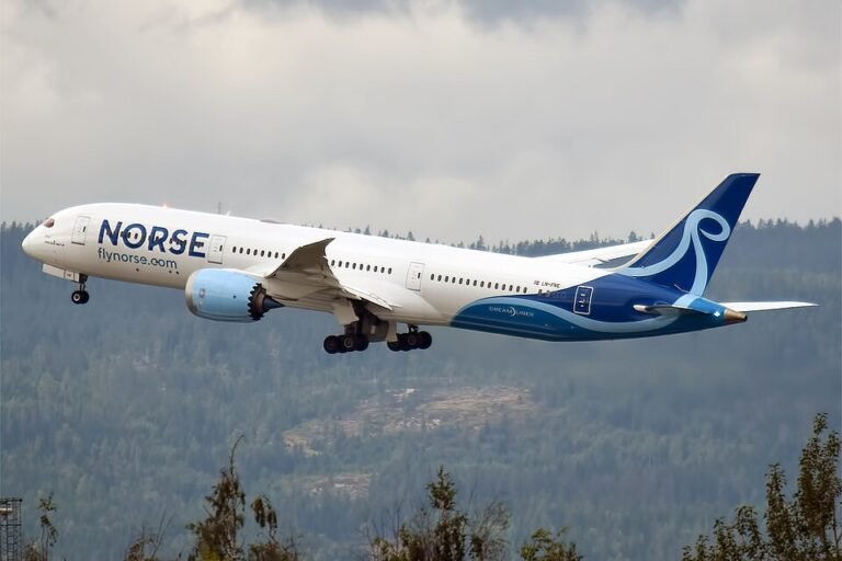 Crawley, United Kingdom: A Norse Atlantic Airways Boeing 787-9 rejected its takeoff from London Gatwick Airport on September 4, 2026 after a reported nose-gear problem, leaving the aircraft disabled on the runway and forcing the airport to temporarily halt flight operations. The aircraft, a Boeing 787-9 Dreamliner registered G-CKOF, was operating Norse Atlantic flight Z0701 from London Gatwick (LGW) to New York John F. Kennedy International Airport (JFK). It was accelerating for departure from Runway 26L when the crew rejected the takeoff at about 120 knots over the ground, according to preliminary aviation incident information. Reports said that the rejected takeoff followed a problem with the aircraft’s nose landing gear and that the nose wheels had turned about 90 degrees. The aircraft then stopped on the runway and became disabled. The precise technical cause of the nose-wheel movement has not been officially declared by the airline. The aircraft remained on Runway 26L while airport emergency teams responded. The incident did not result in any reported injuries among passengers or crew. A passenger onboard, Alice Kavanagh, described the moment the aircraft stopped as frightening, saying the pilot “slammed the brakes on” after a reported technical fault was detected. The Boeing 787 was subsequently removed from the runway. The aircraft blockage had an immediate effect on Gatwick because the airport effectively operates with one runway at a time. Although Gatwick has two runways, their proximity means they cannot normally be used simultaneously for independent operations. As a result, the closure of Runway 26L temporarily stopped both departing and arriving traffic. London Gatwick confirmed that the runway remained closed for 50 minutes because of the incident. “The runway was closed for 50 minutes this afternoon (Friday 4 September) due to a technical issue with a departing aircraft,” a Gatwick spokesperson said. “The aircraft was towed from the runway, which reopened shortly afterwards following a full safety inspection. As always, safety and security is our number one priority.” The runway reopened after airport teams completed the required safety inspection. Subsequent reporting put the reopening at approximately 14:36 BST, although the airport’s official statement characterized it simply as reopening shortly after the aircraft was removed and the inspection was completed. The temporary closure created a wider disruption across Gatwick’s flight schedule. Several inbound flights were diverted to alternative airports, with London Luton and London Stansted among the destinations reported for diverted services. EasyJet flights were also affected by the disruption. Flight-tracking data later showed severe delays affecting more than 330 flights at Gatwick, with an average delay of about 57 minutes. The effects continued after the runway reopened because aircraft, crews and passengers had been displaced during the closure. For the incident, Gatwick has confirmed only that a technical issue involving a departing aircraft caused the runway closure. The more specific information concerning the nose gear and the reported 90-degree movement of the nose wheels remains preliminary. Further maintenance findings or an official investigation would be needed to establish the exact cause of the rejected takeoff.