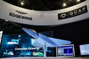 Berlin, Germany: British Prime Minister Andy Burnham said on 8 October 2026 that the United Kingdom was open to Germany joining the Global Combat Air Programme (GCAP), a UK-Italy-Japan initiative to develop a sixth-generation stealth fighter targeted to enter service in 2035. Burnham raised the prospect with German Chancellor Friedrich Merz during his first official visit to Berlin as prime minister, opening a potential new direction for European combat-air cooperation following the collapse of the Franco-German fighter project in June 2026. Speaking at a press conference after meeting Merz at the German Chancellery, Burnham said: “I've indicated to the Chancellor our openness to Germany joining GCAP.” He added: “That is something that we seek to progress in the coming period, working with our other partners, Italy and Japan.” His remarks indicated Britain's willingness to explore German participation, rather than confirming an invitation, an agreement or Germany's entry into the programme. The UK government subsequently confirmed that the two leaders had discussed the prospect of German participation and agreed that their teams would engage further. Its official readout stated that “closer collaboration on defence supports the interests of both countries, as well as our allies”, confirming that the subject had moved beyond public speculation to further bilateral discussions. Berlin has not committed to joining GCAP or any alternative next-generation fighter programme. A German official told Reuters that the government remained at an early stage of reviewing its options, saying: “We're in a very early stage with the re-evaluation of our options.” The official added: “Germany hasn't taken a fixed decision, it's looking in various directions.” The official also reiterated Merz's preference for a European solution rather than Germany pursuing a fighter programme independently. The position leaves open several possibilities, including participation in GCAP, a different European industrial arrangement or a broader approach to future combat-air capabilities. The discussions follow the breakdown of the Future Combat Air System (FCAS), the approximately €100 billion programme involving France, Germany and Spain. On 8 June 2026, reports said Merz and French President Emmanuel Macron had concluded that the project could not proceed in its original form because Dassault Aviation and Airbus had failed to resolve their industrial disagreements over the next-generation fighter. Germany's search for alternatives has consequently intensified interest in GCAP. GCAP brings together the UK, Italy and Japan to develop a next-generation combat aircraft intended to combine stealth, advanced sensors, artificial intelligence and integrated combat systems. The programme is designed to deliver an aircraft capable of maintaining air superiority against future threats, including increasingly sophisticated capabilities being developed by Russia and China. The industrial programme is led by BAE Systems in the UK, Leonardo in Italy and Mitsubishi Heavy Industries in Japan through the international development structure. Its target is to bring the aircraft into service in 2035. Japan has a particularly strong incentive to maintain that timeline because its F-2 fighter fleet is due to begin retirement around the middle of the next decade, while Tokyo is increasingly concerned about China's military expansion. Germany could offer significant industrial expertise, additional investment and a larger market for the programme. It already cooperates with the UK and Italy on the Eurofighter Typhoon, providing an established foundation for defence-industrial collaboration. For Britain, bringing in another partner could also help distribute development costs as defence budgets face competing demands. However, a German role would require agreement among the existing partners. Japan's focus on the 2035 deadline makes the timing and scope of any expansion particularly sensitive. Reuters reported that some industry executives had warned that bringing additional countries into the programme could create delays, although the extent of any effect would depend on the terms of participation. Canada provides a precedent for wider participation: GCAP's structure allows countries to engage at different levels, rather than requiring every participant to enter the programme on identical terms. On 21 July 2026, the UK, Italy and Japan welcomed Canada as the programme's first observer nation following discussions in London attended by UK Defence Secretary Wes Streeting, Italian Defence Minister Guido Crosetto, Japanese Defence Minister Shinjiro Koizumi and Canadian Defence Minister David J. McGuinty. The official joint statement said observer status would give Canada greater insight into GCAP's governance, capabilities, industrial framework and security requirements, as well as potential future partnership opportunities. It did not make Canada a full development partner or establish that Germany would receive equivalent terms. Saudi Arabia has also been discussed as a possible future participant, according to Reuters. Any further expansion would need to balance the advantages of shared funding and wider industrial participation against the complexity of integrating additional national requirements. Wider UK-Germany security cooperation: The fighter discussion formed part of a broader programme of defence and security cooperation during Burnham's Berlin visit on 8 October 2026. The two leaders reaffirmed the UK-Germany partnership under the Kensington Treaty and agreed to pursue deeper cooperation on European security, countering hybrid threats, supporting Ukraine and addressing illegal migration. The UK government said Burnham expressed solidarity with Germany following an attempted Russian drone attack at Leipzig airport. The leaders agreed on the need for a collective European response to Russia's hybrid threats and welcomed a new bilateral partnership intended to strengthen information-sharing, contingency planning and crisis response. They also discussed countering malicious misinformation and maintaining pressure on Russia through the winter. Ahead of the visit, Burnham described the threat posed by attacks on critical infrastructure, businesses and democratic institutions. As reported by Al Jazeera, he said: “Attacks on our infrastructure, our businesses and our democracies are not a distant threat. They reach into people's homes and workplaces and they are designed to make us weaker and more divided.” The Kensington Treaty, signed in July 2025, provides the wider framework for closer UK-Germany cooperation in science, technology, defence, security and economic growth. The leaders also discussed the need for stronger cooperation between British and European industries and agreed to continue work on the priorities raised during their meeting. The immediate next step is further engagement between British and German officials on the prospect of GCAP participation, in coordination with Italy and Japan. No formal German accession decision, agreed industrial workshare or confirmed financial contribution had been announced as of 9 October 2026. For GCAP, Germany could bring additional funding, technical capability and industrial scale at a time when Europe is reconsidering how to develop its future combat-air systems. But the opportunity comes with unresolved questions about governance, technology-sharing, industrial responsibilities and the risk of disrupting the programme's 2035 target. Burnham's statement therefore marks a significant political opening, not a completed expansion of GCAP. Whether Germany joins will depend on the outcome of discussions with Berlin and the programme's existing partners, and on whether an arrangement can meet Germany's industrial ambitions without compromising the aircraft's development schedule.