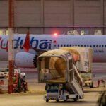 Abu Dhabi, United Arab Emirates: Investigations into the incident involving flydubai flight FZ1073 found that the co-pilot had attempted to carry out a terrorist attack, Prosecutor General Hamad Saif Al Shamsi said in a statement carried by the UAE's state news agency. According to the UAE Attorney-General, the co-pilot had begun executing his plan during the flight, attacking the captain inside the flight deck with the aircraft's crash axe and attempting to take control of the aircraft's flight controls. The statement marks the UAE's first official confirmation that the incident was a planned terrorist act rather than simply an in-flight altercation. The investigation remains ongoing. Al Shamsi said authorities are examining the full circumstances of the incident, the motive and any related links, while also completing technical examinations and analysing physical and digital evidence. He said the final findings will be announced after all necessary procedures are completed. Flight FZ1073 was operating from Dubai International Airport to Ben Gurion International Airport in Tel Aviv on September 30 when the cockpit incident occurred. The Boeing 737 was diverted to Tabuk Airport in northwestern Saudi Arabia and landed safely. The UAE's General Civil Aviation Authority (GCAA) said the security incident was brought under control after members of the crew intervened. Several crew members were injured and taken to hospital in Saudi Arabia. The captain has been identified as Indian national Captain Smit Machchhar. According to the UAE Attorney-General's account, the co-pilot attacked Machchhar inside the cockpit with a crash axe before attempting to seize control of the aircraft. Reports from the incident described Machchhar as sustaining serious injuries during the confrontation. Despite being injured, he managed to open the cockpit door, allowing passengers and other crew members to enter and help restrain the co-pilot. Two reserve pilots who were travelling on the aircraft subsequently took control and landed the aircraft safely at Tabuk. Flight-tracking data showed a sharp descent during the cockpit struggle before the aircraft was stabilised. The aircraft also transmitted an emergency code associated with unlawful interference during the incident. The UAE GCAA later commended Captain Machchhar, the flight crew and passengers for their response, saying their swift intervention helped contain the situation and prevent more serious consequences. The authority said Machchhar had returned safely to the UAE and was receiving medical treatment. The identity of the co-pilot has not been officially released by UAE authorities. However, multiple international media outlets have identified him as Hammam al-Hammami, an Omani national, citing sources familiar with the investigation. Reuters reported that two sources familiar with the investigation identified the co-pilot as Hammam al-Hammami, while UAE authorities had not immediately confirmed his identity. Media reports have also raised questions about his previous aviation history. Reuters and other outlets have reported that he had previously been barred from flying in Oman over concerns about alleged extremist views. Those reports remain part of the wider investigation and should not be treated as established findings unless confirmed by the relevant authorities. The UAE began its investigation immediately after the incident. On October 1, Attorney-General Al Shamsi ordered a specialised Public Prosecution team to investigate the incident in coordination with the General Civil Aviation Authority and other UAE authorities. At that stage, authorities specifically directed investigators to determine whether the incident was linked to terrorist activity or purpose, or involved prior planning or direction. The UAE also warned against speculation and unverified reports while the investigation was under way. The UAE Ministry of Foreign Affairs said its judicial authorities have jurisdiction because the aircraft is registered in the UAE and operates under the UAE flag. It said UAE law therefore applies to crimes committed aboard the aircraft even when they occur outside UAE territory. The ministry also acknowledged Saudi authorities' cooperation in handling the incident. The latest statement from Al Shamsi now establishes the central finding of the investigation so far: the co-pilot had attempted to carry out a terrorist act and had begun executing his plan during the flight. Authorities, however, have not yet publicly established the motive or disclosed whether he acted alone or had any wider connections. Following the incident, flydubai suspended its flights between Dubai and Tel Aviv. The suspension remains in place while the investigation continues. Flydubai initially confirmed that FZ1073, operating from Dubai International Airport to Ben Gurion International Airport on September 30, had experienced an incident while en route. The airline said the aircraft landed safely at Tabuk and that all passengers were safe and accounted for, while its teams worked with the relevant authorities. The airline has said the circumstances surrounding the incident remain under investigation and that it is cooperating with the authorities. The suspension of Israel services was implemented as investigators examined the security incident and its wider implications. The investigation involves multiple authorities across three countries. In the UAE, the Public Prosecution is leading the criminal investigation in coordination with the General Civil Aviation Authority (GCAA) and other competent authorities. Saudi authorities, including the National Transport Safety Center, conducted the initial investigation after the aircraft landed in Tabuk, with UAE security officials also involved. Separately, Australian authorities, through the Victorian Joint Counter Terrorism Team comprising the Australian Federal Police, Victoria Police and ASIO, are examining the co-pilot's links to Australia. The investigation into the motive, circumstances and any wider connections remains ongoing.