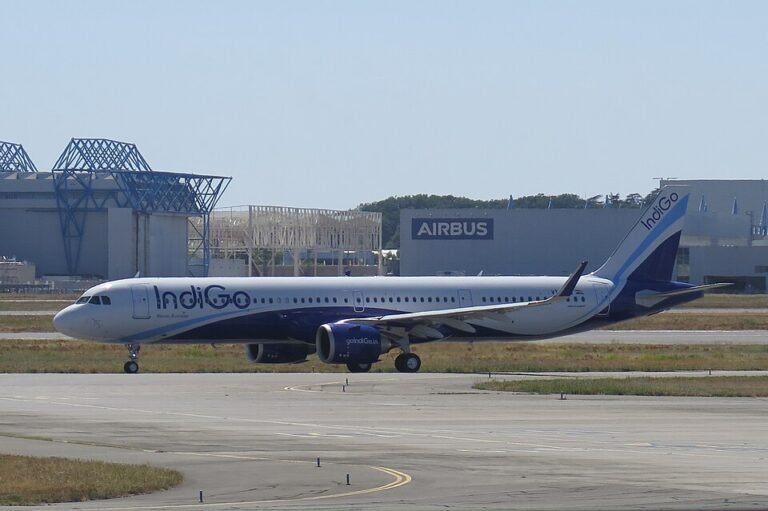 Hyderabad, India: An IndiGo flight operating from Delhi to Chennai was diverted to Hyderabad on 11 October after smoke was detected from a passenger’s personal electronic device, with media reports identifying the device as a power bank that caught fire inside the aircraft’s overhead storage compartment. The aircraft landed safely at Rajiv Gandhi International Airport (RGIA), Hyderabad, and an alternative aircraft was arranged to take passengers to Chennai. The flight, numbered 6E 6115, was operated by an Airbus A321, media reported that 191 people were aboard the aircraft. The exact breakdown of passengers and crew has not been independently confirmed through an official airline statement. No injuries were reported in connection with this flight. In a statement IndiGo said: “IndiGo flight 6E 6115, operating from Delhi to Chennai on October 11, 2026, was diverted to Hyderabad after smoke was detected from a customer’s personal electronic device. The cabin crew responded promptly and the situation was brought under control. In line with established protocols, the pilots diverted the flight and landed safely at Rajiv Gandhi International Airport, Hyderabad. An alternate aircraft has been arranged to continue the journey to Chennai.” The airline added: “We regret the inconvenience caused to our customers due to this unforeseen situation and are making all efforts to minimise it, including offering refreshments and sharing timely updates.” Visuals circulated on social media and published by news outlets appeared to show flames and smoke coming from an overhead compartment, with passengers attempting to contain the fire. However, IndiGo’s statement did not specify the device involved, confirm the exact location of the fire or explain what caused the smoke. The power bank identification and details of the fire were reported by media outlets. The incident has renewed attention on the carriage and use of lithium-ion batteries aboard aircraft. IndiGo’s published baggage policy states that power banks and spare or loose lithium batteries are permitted only in hand baggage. They must remain within the passenger’s personal reach, such as under the seat, in a seat pocket or carried on the person. The policy explicitly states that these items must not be stored in overhead compartments or checked baggage. The airline’s policy also says that, subject to applicable security clearance, passengers may carry up to two spare or loose lithium-ion batteries, including power banks, rated up to 100 watt-hours (Wh). Batteries between 100 Wh and 160 Wh may be permitted under specified approval conditions for portable medical devices. Battery terminals must be insulated to prevent short circuits, and power banks must not be recharged or used to charge another device while aboard the aircraft. IndiGo’s boarding information also instructs passengers not to use or charge power banks during flights. The airline’s restrictions apply to both domestic and international services. The reported location of the fire is significant because the airline’s policy specifically prohibits storing power banks in overhead compartments. However, the available reporting does not establish how the device came to be stored there or whether any passenger or airline procedure was breached. The Directorate General of Civil Aviation (DGCA) issued a Dangerous Goods Advisory Circular on 11 November 2025, advising airlines to prohibit the use of power banks to charge portable electronic devices during flights because of safety concerns involving lithium batteries. In a written answer to Rajya Sabha Unstarred Question No. 1801, answered on 9 March 2026, the Ministry of Civil Aviation confirmed the advisory’s date and purpose. The government stated that the DGCA issued the circular “advising airlines to prohibit the use of power banks for charging portable electronic devices during flight, in view of safety concerns arising from lithium battery-related incidents.” The government also stated that the first such instance was reported to the DGCA on 19 October 2025. The parliamentary answer referred to the advisory and the Aircraft (Carriage of Dangerous Goods) Rules, 2026. Lithium-ion batteries can overheat and enter a process known as thermal runaway, potentially causing smoke, fire and the release of hot gases. Such events can be difficult to manage in an aircraft cabin, making prompt detection and crew intervention important. The precise mechanism behind the reported fire on flight 6E 6115 has not been established in the airline statement or the reports cited here. Earlier IndiGo power bank incidents: The latest incident follows an earlier power bank fire aboard IndiGo flight 6E 108, which operated from Hyderabad to Chandigarh on 5 May 2026. The aircraft had landed in Chandigarh and was taxiing when a passenger’s power bank caught fire in a seat pocket. Two fire extinguishers were used, and passengers were evacuated. Another incident occurred on 19 October 2025, when a passenger’s power bank reportedly caught fire in a seat-back pocket aboard IndiGo flight 6E 2107 from Delhi to Dimapur while the aircraft was taxiing for take-off. The flight returned to its parking bay. These incidents have highlighted the importance of keeping power banks accessible, avoiding their use during flights and informing cabin crew immediately if a device becomes unusually hot, emits smoke or produces an unusual smell. For the 11 October incident, the airline’s publicly reported statement confirms the smoke detection, crew response, diversion and safe landing. The precise cause of the fire, the device’s specifications and the circumstances in which it was stored remain unconfirmed.