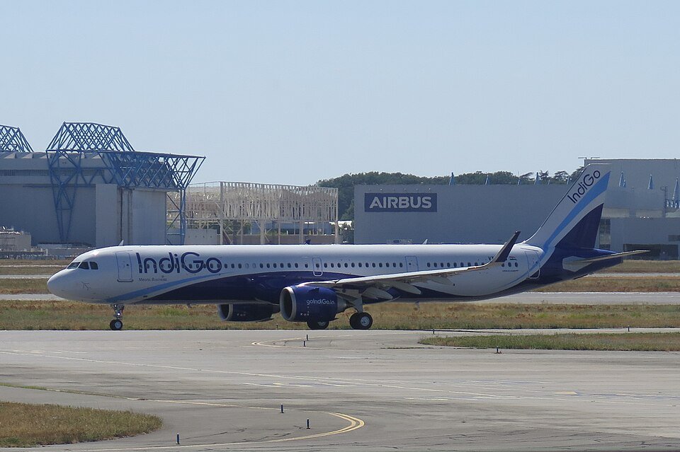 Hyderabad, India: An IndiGo flight operating from Delhi to Chennai was diverted to Hyderabad on 11 October after smoke was detected from a passenger’s personal electronic device, with media reports identifying the device as a power bank that caught fire inside the aircraft’s overhead storage compartment. The aircraft landed safely at Rajiv Gandhi International Airport (RGIA), Hyderabad, and an alternative aircraft was arranged to take passengers to Chennai. The flight, numbered 6E 6115, was operated by an Airbus A321, media reported that 191 people were aboard the aircraft. The exact breakdown of passengers and crew has not been independently confirmed through an official airline statement. No injuries were reported in connection with this flight. In a statement IndiGo said: “IndiGo flight 6E 6115, operating from Delhi to Chennai on October 11, 2026, was diverted to Hyderabad after smoke was detected from a customer’s personal electronic device. The cabin crew responded promptly and the situation was brought under control. In line with established protocols, the pilots diverted the flight and landed safely at Rajiv Gandhi International Airport, Hyderabad. An alternate aircraft has been arranged to continue the journey to Chennai.” The airline added: “We regret the inconvenience caused to our customers due to this unforeseen situation and are making all efforts to minimise it, including offering refreshments and sharing timely updates.” Visuals circulated on social media and published by news outlets appeared to show flames and smoke coming from an overhead compartment, with passengers attempting to contain the fire. However, IndiGo’s statement did not specify the device involved, confirm the exact location of the fire or explain what caused the smoke. The power bank identification and details of the fire were reported by media outlets. The incident has renewed attention on the carriage and use of lithium-ion batteries aboard aircraft. IndiGo’s published baggage policy states that power banks and spare or loose lithium batteries are permitted only in hand baggage. They must remain within the passenger’s personal reach, such as under the seat, in a seat pocket or carried on the person. The policy explicitly states that these items must not be stored in overhead compartments or checked baggage. The airline’s policy also says that, subject to applicable security clearance, passengers may carry up to two spare or loose lithium-ion batteries, including power banks, rated up to 100 watt-hours (Wh). Batteries between 100 Wh and 160 Wh may be permitted under specified approval conditions for portable medical devices. Battery terminals must be insulated to prevent short circuits, and power banks must not be recharged or used to charge another device while aboard the aircraft. IndiGo’s boarding information also instructs passengers not to use or charge power banks during flights. The airline’s restrictions apply to both domestic and international services. The reported location of the fire is significant because the airline’s policy specifically prohibits storing power banks in overhead compartments. However, the available reporting does not establish how the device came to be stored there or whether any passenger or airline procedure was breached. The Directorate General of Civil Aviation (DGCA) issued a Dangerous Goods Advisory Circular on 11 November 2025, advising airlines to prohibit the use of power banks to charge portable electronic devices during flights because of safety concerns involving lithium batteries. In a written answer to Rajya Sabha Unstarred Question No. 1801, answered on 9 March 2026, the Ministry of Civil Aviation confirmed the advisory’s date and purpose. The government stated that the DGCA issued the circular “advising airlines to prohibit the use of power banks for charging portable electronic devices during flight, in view of safety concerns arising from lithium battery-related incidents.” The government also stated that the first such instance was reported to the DGCA on 19 October 2025. The parliamentary answer referred to the advisory and the Aircraft (Carriage of Dangerous Goods) Rules, 2026. Lithium-ion batteries can overheat and enter a process known as thermal runaway, potentially causing smoke, fire and the release of hot gases. Such events can be difficult to manage in an aircraft cabin, making prompt detection and crew intervention important. The precise mechanism behind the reported fire on flight 6E 6115 has not been established in the airline statement or the reports cited here. Earlier IndiGo power bank incidents: The latest incident follows an earlier power bank fire aboard IndiGo flight 6E 108, which operated from Hyderabad to Chandigarh on 5 May 2026. The aircraft had landed in Chandigarh and was taxiing when a passenger’s power bank caught fire in a seat pocket. Two fire extinguishers were used, and passengers were evacuated. Another incident occurred on 19 October 2025, when a passenger’s power bank reportedly caught fire in a seat-back pocket aboard IndiGo flight 6E 2107 from Delhi to Dimapur while the aircraft was taxiing for take-off. The flight returned to its parking bay. These incidents have highlighted the importance of keeping power banks accessible, avoiding their use during flights and informing cabin crew immediately if a device becomes unusually hot, emits smoke or produces an unusual smell. For the 11 October incident, the airline’s publicly reported statement confirms the smoke detection, crew response, diversion and safe landing. The precise cause of the fire, the device’s specifications and the circumstances in which it was stored remain unconfirmed.