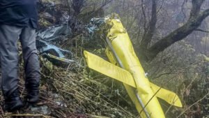 Joshimath, India: Six people, including the pilot, were killed after a helicopter crashed in the forested mountainous region near Chai village in Joshimath, Chamoli district, Uttarakhand, on Friday, October 30, 2026. The helicopter was flying from Badrinath to the Sahastradhara helipad in Dehradun with one pilot and five passengers when it crashed. The Ministry of Civil Aviation confirmed the accident in a statement issued through the Press Information Bureau (PIB) at 9:11 PM on Friday. According to the ministry, the helicopter operated by Trans Bharat Aviation, departed from Badrinath helipad at 1:14 PM and was en route to Sahastradhara helipad when the accident occurred. The ministry identified the crash location as the forest area near Chai village in Joshimath. The Ministry of Civil Aviation did not specify whether the service was a charter, scheduled passenger service or pilgrimage flight. Uttarakhand Civil Aviation Development Authority (UCADA) CEO Prateek Jain confirmed that all six occupants, including the pilot, had died. Chamoli District Magistrate Gaurav Kumar also confirmed the fatalities. The deceased included pilot Captain Himanshu Sabharwal, a resident of Delhi, and five passengers from Karnataka: Arun Salunke, Prathapa Bachihally Ningaraju, Shankar Gowda VB, Sudheer K and H.S. Nataraju. Karnataka Home Minister Priyank Kharge identified Arun Salunke as an inspector with the Bengaluru Police Central Crime Branch (CCB). The Karnataka government subsequently confirmed that the mortal remains of all six occupants had been recovered. According to UCADA, the helicopter lost communication while flying over the Joshimath valley, after which its tracking system also stopped receiving location information. The authority stated, "The helicopter lost communication while it was flying over Joshimath valley. At the same time, the tracking system could no longer track the helicopter." Chamoli Superintendent of Police Surjeet Singh Panwar said the aircraft's radar transmission link was lost near Joshimath approximately two minutes after its departure from Badrinath. Uttarakhand Secretary for Disaster Management and Rehabilitation Vinod Kumar Suman said the Chamoli District Disaster Management Officer informed the authorities at around 2 PM that a civilian helicopter had met with an accident. An Army Signal Centre team subsequently spotted smoke rising from the helicopter and observed it descending rapidly, prompting a coordinated search and rescue response. The Chamoli district administration, Indian Army, State Disaster Response Force (SDRF), Indo-Tibetan Border Police (ITBP), police and health department personnel were mobilised to locate the aircraft and reach the crash site. Uttarakhand Chief Minister Pushkar Singh Dhami confirmed the joint response, stating, "A joint rescue operation is being conducted by the district administration, disaster management department, and SDRF." He added, "I myself am continuously monitoring the entire incident." The Karnataka government, citing information from the Uttarakhand State Emergency Operations Centre, confirmed that rescue teams recovered the mortal remains of all six occupants. The remains were being brought to Joshimath for post-mortem examinations. The Chief Minister's Office and the Relief Commissioner of Karnataka coordinated with their Uttarakhand counterparts to facilitate the transportation of the deceased to Karnataka. Following the accident, UCADA in coordination with the Directorate General of Civil Aviation grounded the entire helicopter fleet operated by Trans Bharat Aviation Pvt Ltd as a precautionary measure. The Ministry of Civil Aviation also confirmed that a team from the Directorate General of Civil Aviation (DGCA) had been dispatched to Dehradun to conduct a preliminary and regulatory assessment of the accident. The exact cause of the crash has not yet been established. Although adverse weather conditions, including rain and reduced visibility, were reported in the region, authorities have not confirmed whether they contributed to the accident. The circumstances leading to the loss of communication and the subsequent crash remain subject to further assessment.